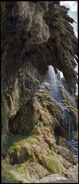 Vulci stalactite cliff and waterfall