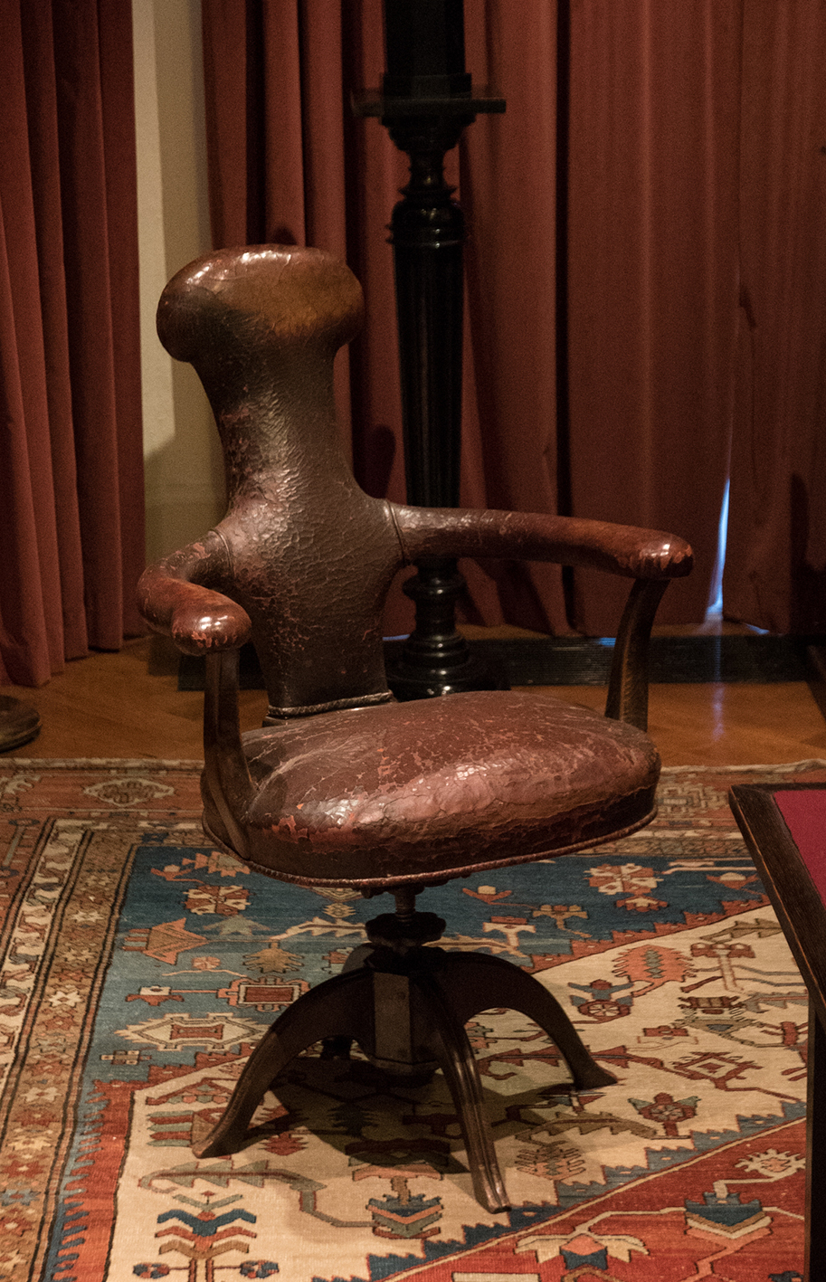 Richmond Nicholas Photography. Freud's study in London - his remarkable chair made to his own design.